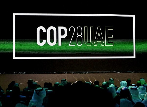 지난 1월 UAE 아부다비에서 'COP28을 향한 기후행동의 연합'이라는 주제로 열린 아부다비 지속가능성주간(ADSW) 개막식에서 'Cop28 UAE' 로고가 화면에 표시돼 있다. 2023..1.16. 사진=연합뉴스/로이터