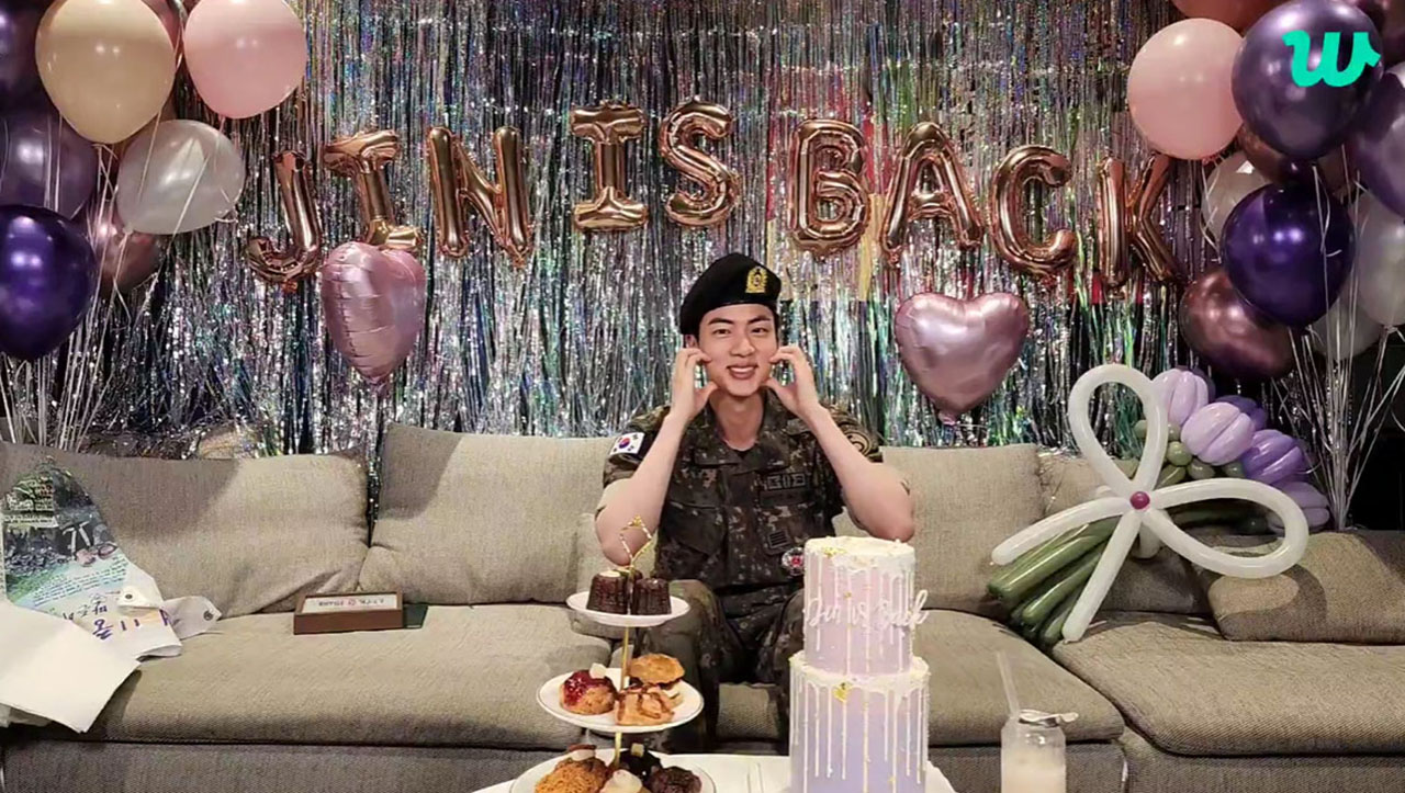Image :  Screenshot of BTS's Jin on Weverse Live immediately after military discharge